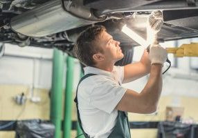 Young mechanic in garage